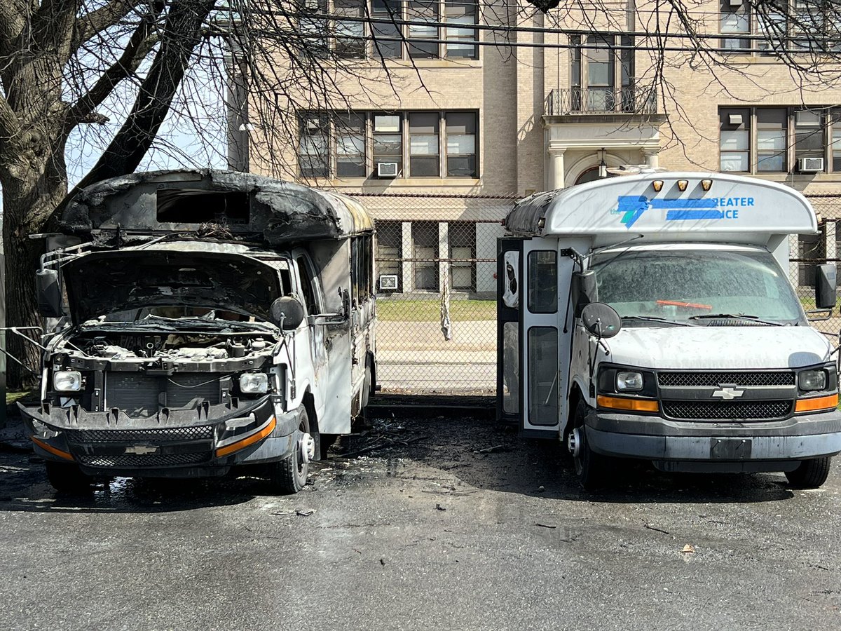 Providence firefighters extinguished flames after a bus caught fire in the city's west end. Investigators are on scene. The cause is unknown