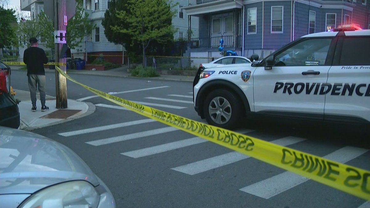 Two teenagers are shot and injured while attending a vigil in Providence.