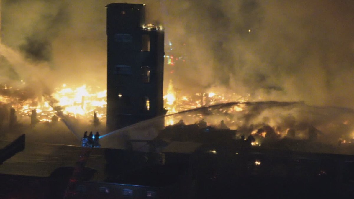 Raging blaze destroys mill building in Rhode Island