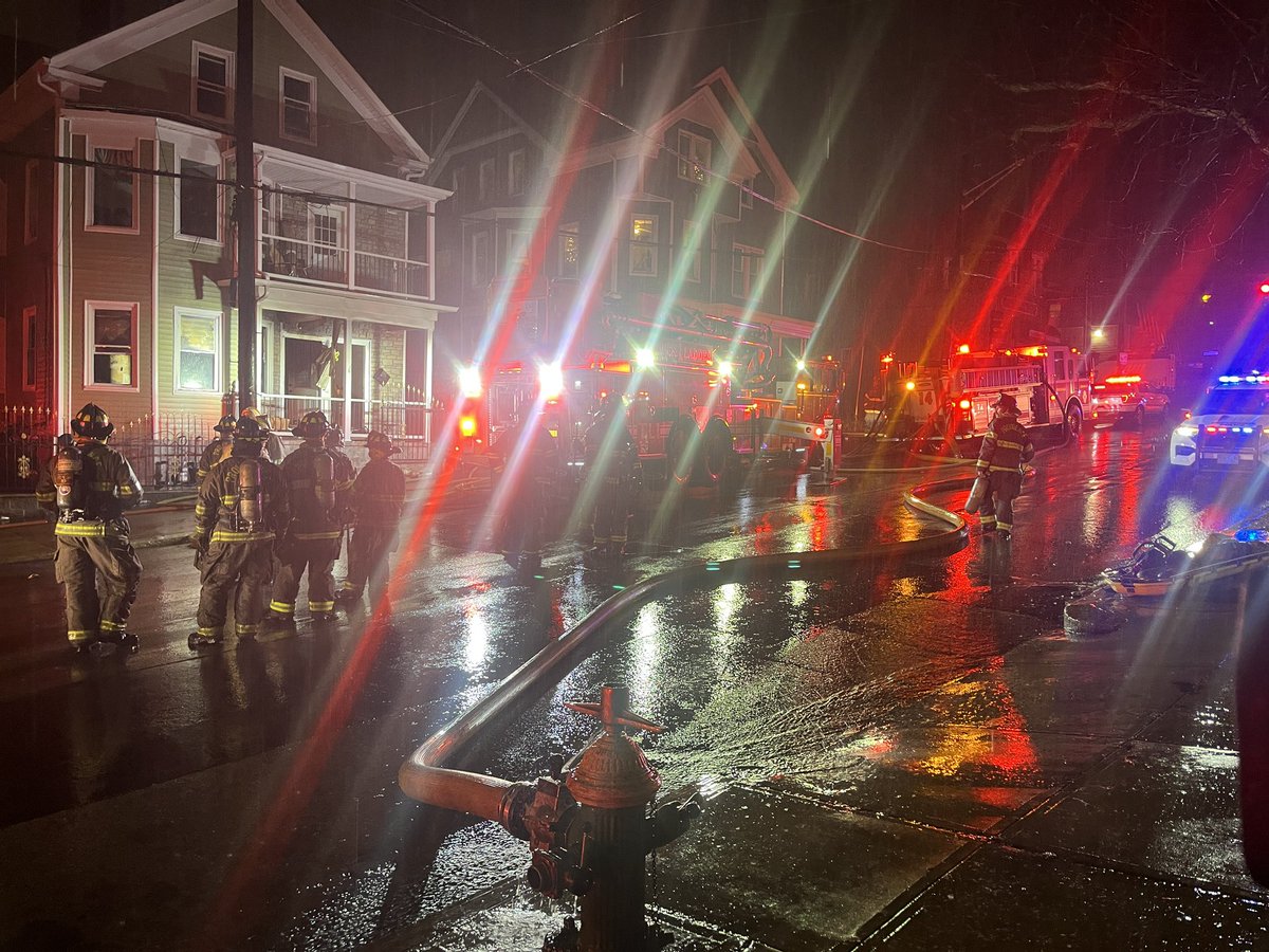 Providence firefighter is battling the rain for a two-story home fire on Atwells Avenue. Multiple ladders on scene and reports of a rescue.