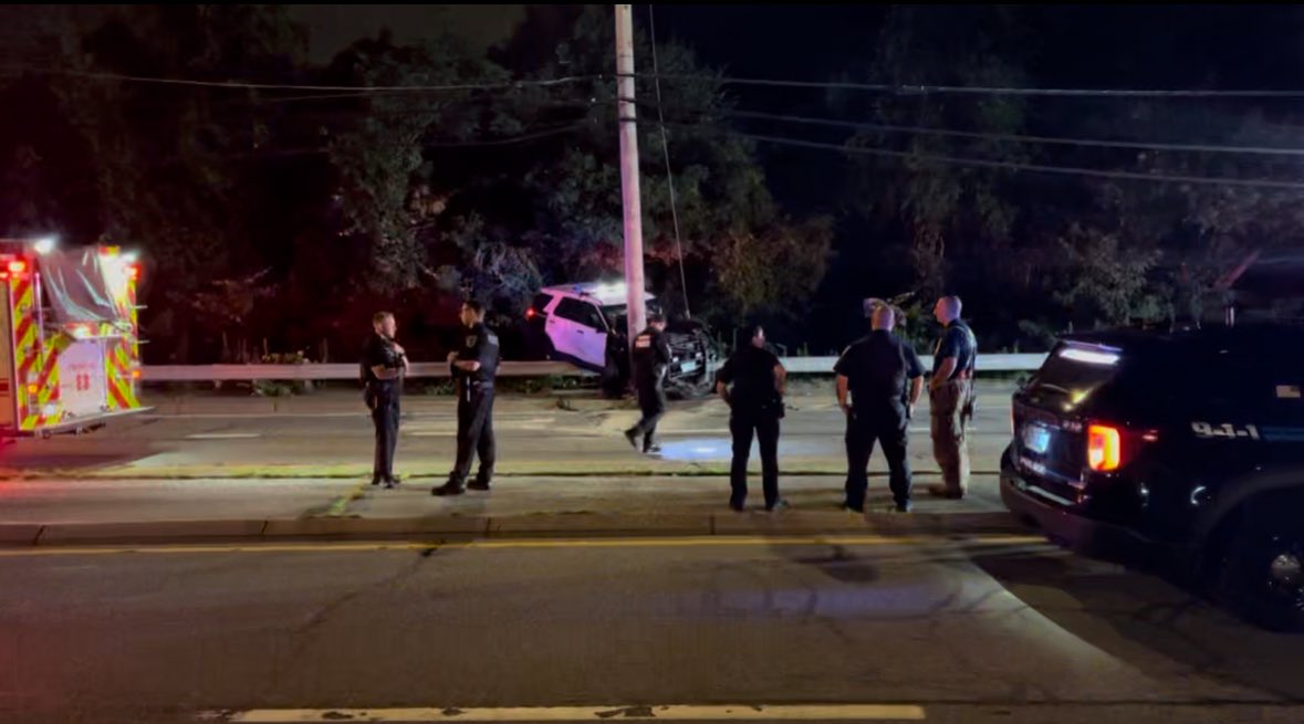 A Johnston police cruiser crashes into a pole during a pursuit
