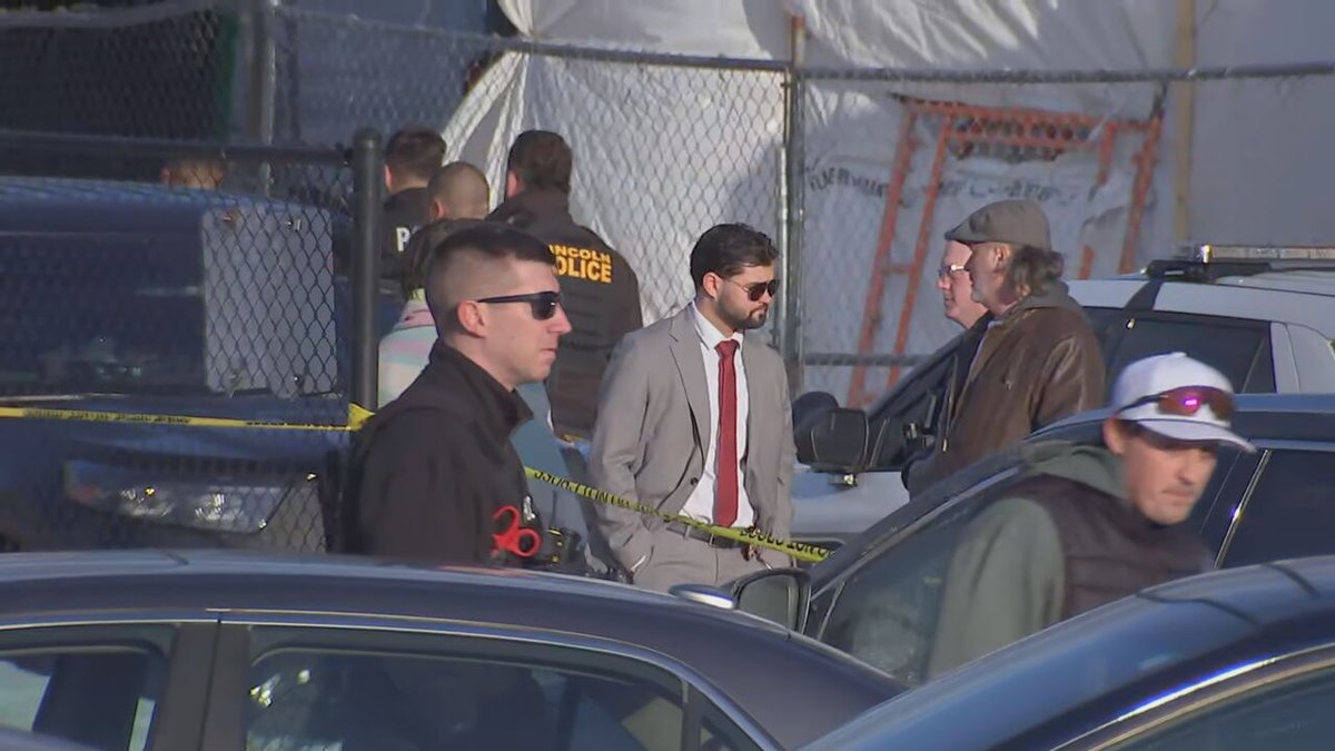 A large law enforcement presence remains in place amid an investigation into a deadly shooting at an ice arena in Rhode Island