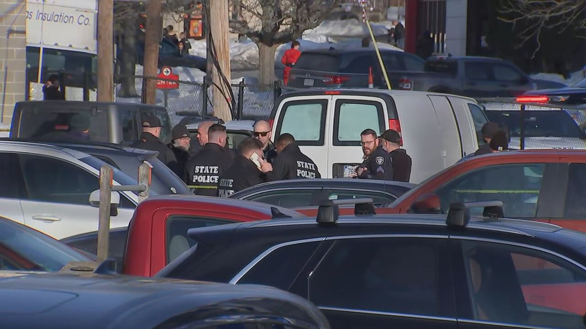 A large law enforcement presence remains in place amid an investigation into a deadly shooting at an ice arena in Rhode Island